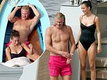 Erling Haaland cosies up to his girlfriend Isabel Haugseng Johansen as they relax on his megayacht during a holiday to Capri