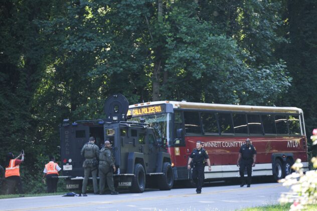 He rambled to reporters after a downtown Atlanta shooting. Then, police say, he hijacked a bus
