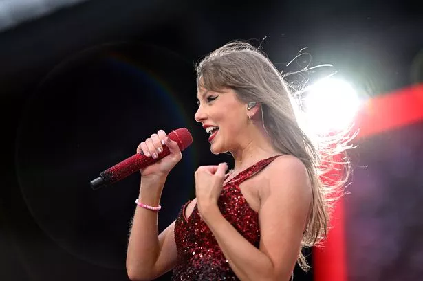 Taylor Swift announces she's broken Liverpool FC record at first Anfield show