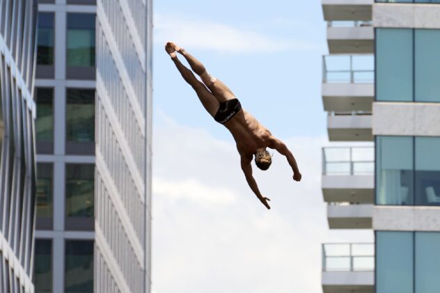 They're on the edge of glory, and the edge of an art museum, as cliff divers come to Boston