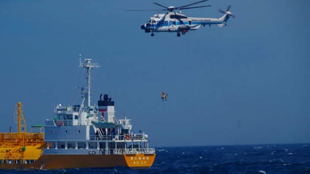 Woman swept out to sea off Japanese beach is rescued 37 hours later -- and 50 miles offshore